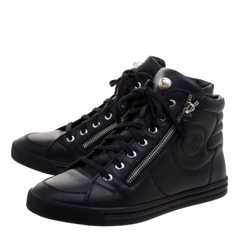 black chanel high top sneakers.